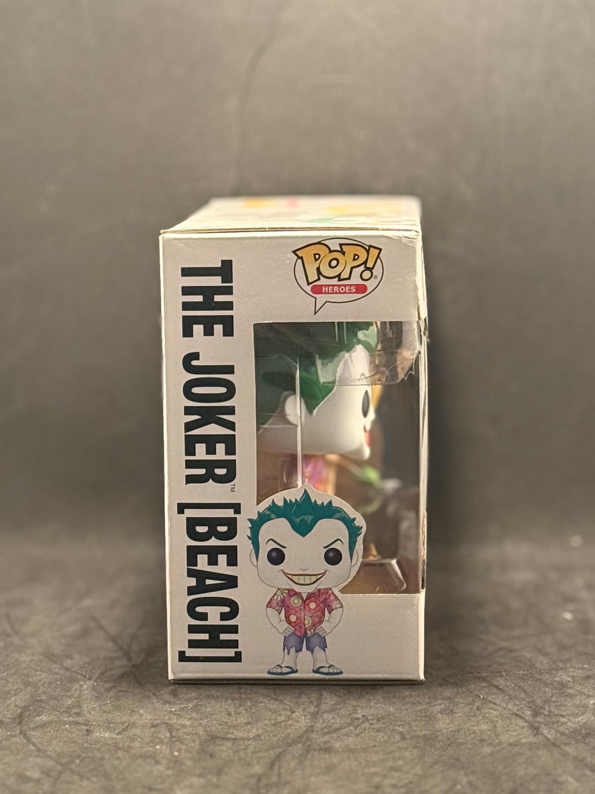 Funko POP! Heroes - Super Heroes - The Joker (Beach) & Harley Quinn (2 Pack) Exclusive "Small Box Damage"