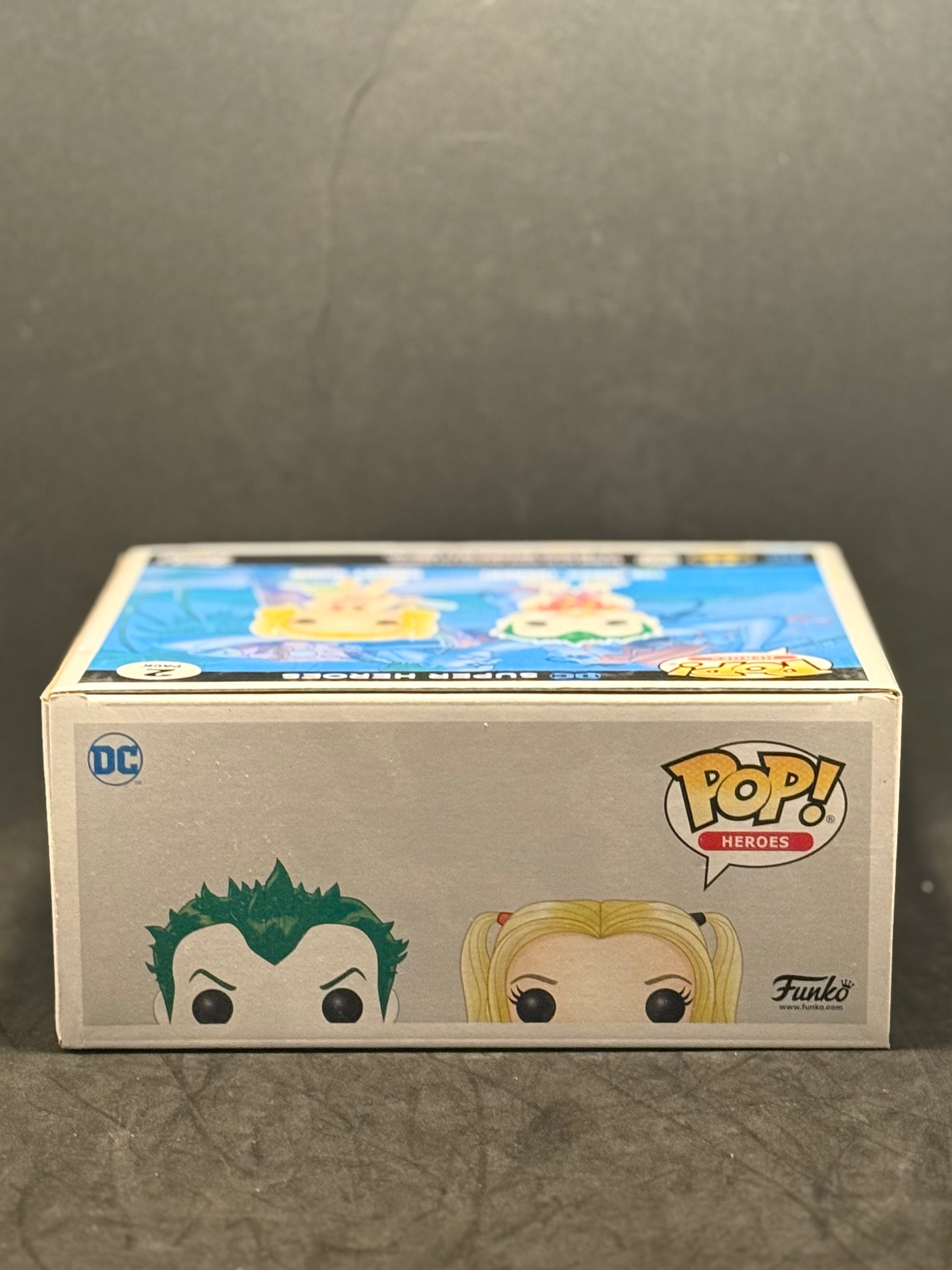 Funko POP! Heroes - Super Heroes - The Joker (Beach) & Harley Quinn (2 Pack) Exclusive "Small Box Damage"